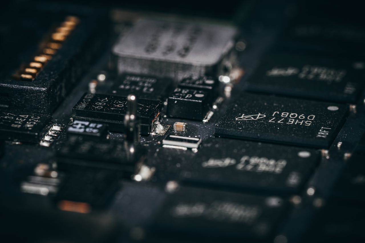 About Detailed macro shot of electronic circuit components showcasing intricate design and layout.
